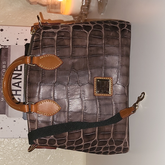 Dooney & Bourke Handbags - Dooney & Bourke brown crocodile leather wrist bag, red interior 👌